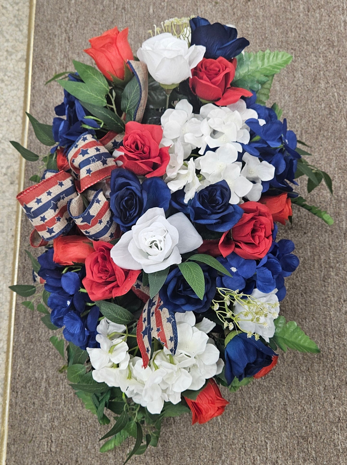 Patriotic Memorial Cemetery Saddle – Red, White & Blue Silk Florals